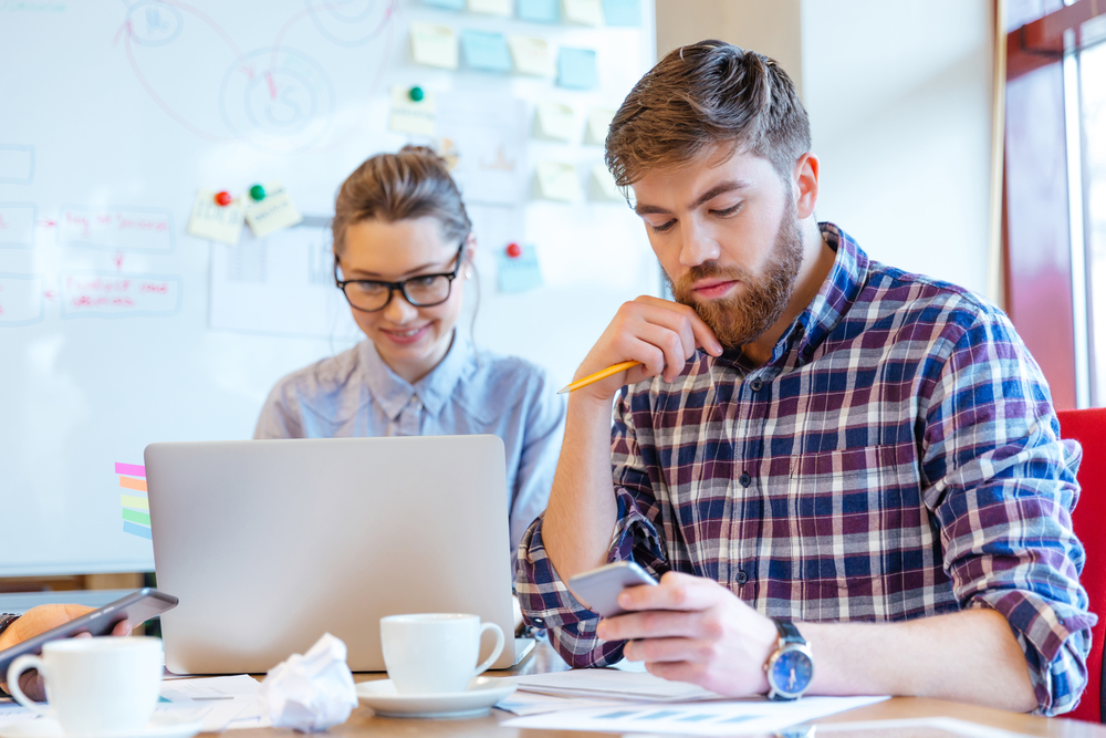 Young business people working in office