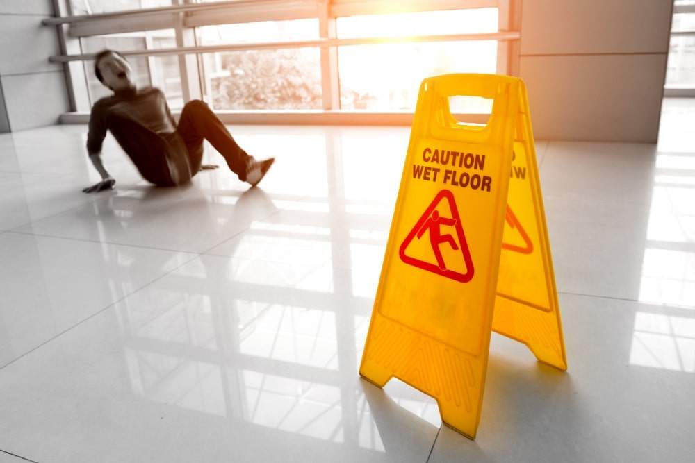 man slipping and falling in the workplace