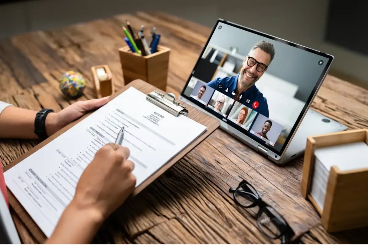 A small business owner having a video interview for a remote hiring position